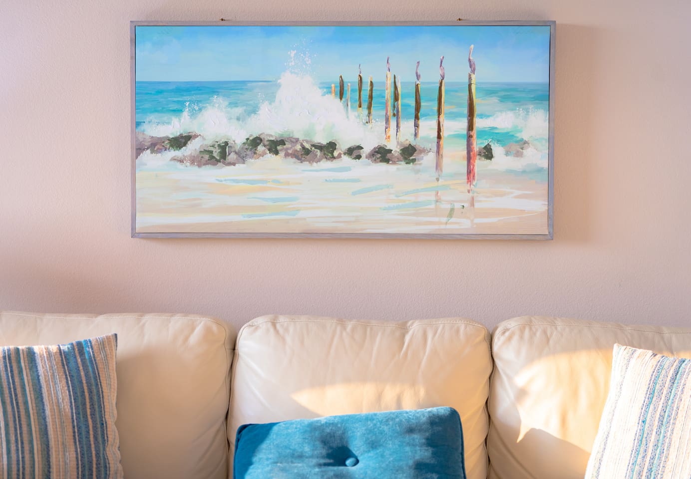 Huge open cozy living room with 70-inch LED Smart TV, Fireplace and Gulf Views