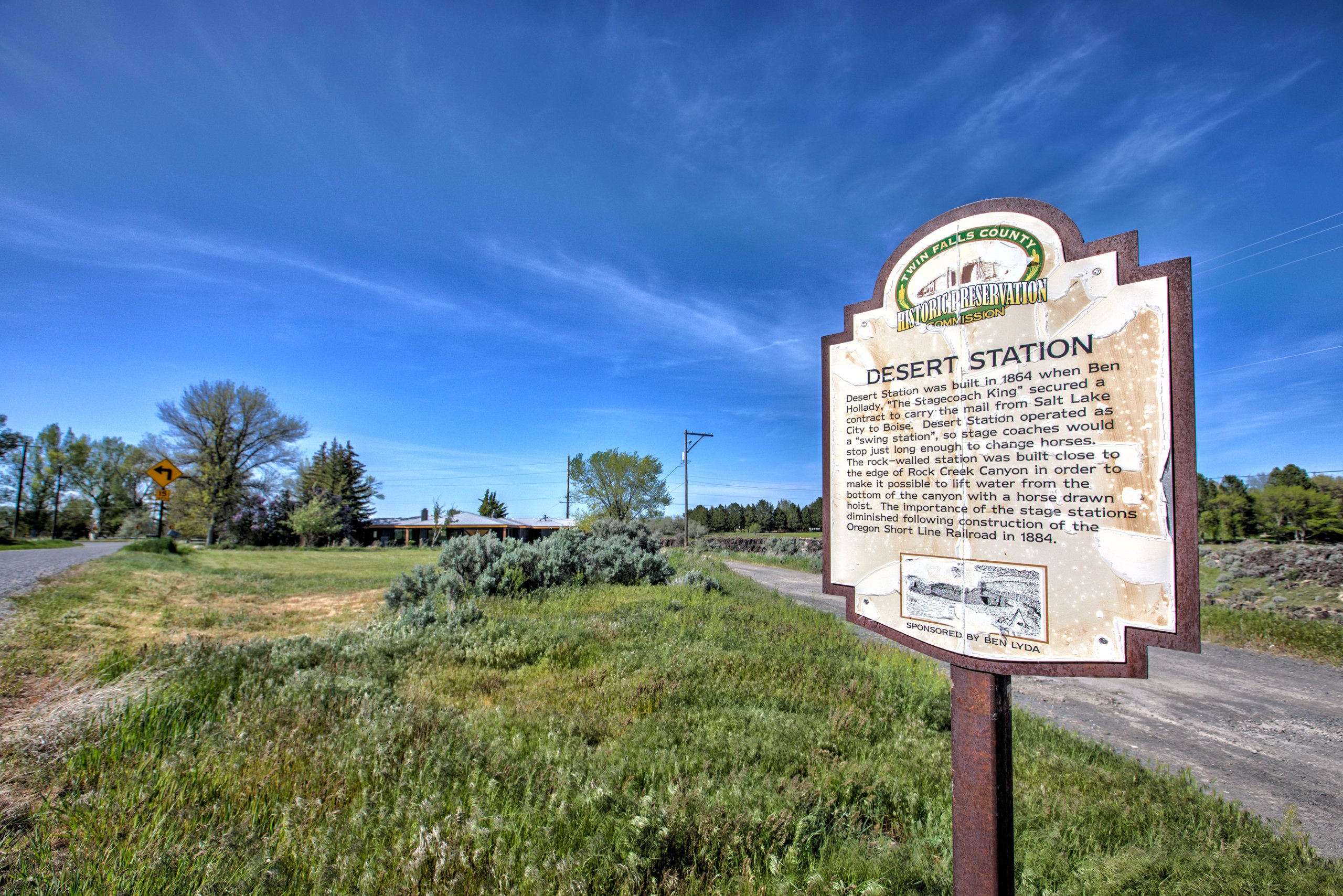 Historic Desert Station marker on the corner of the property near the drive