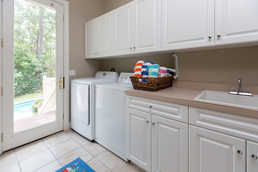 Laundry room - "Loads" of fun!  And we provide beach towels for your convenience