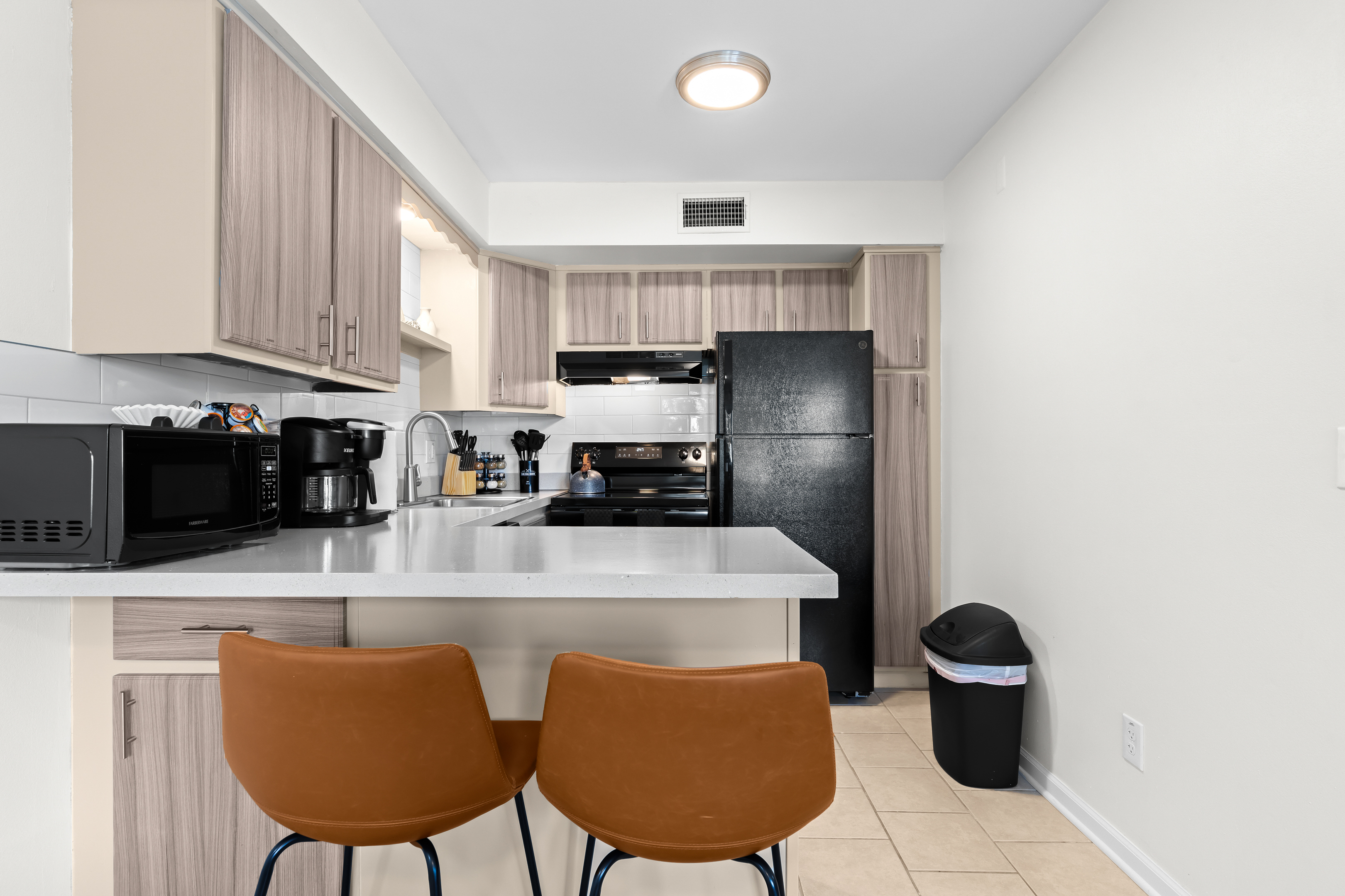 Ample counter space and a breakfast bar for casual dining.
