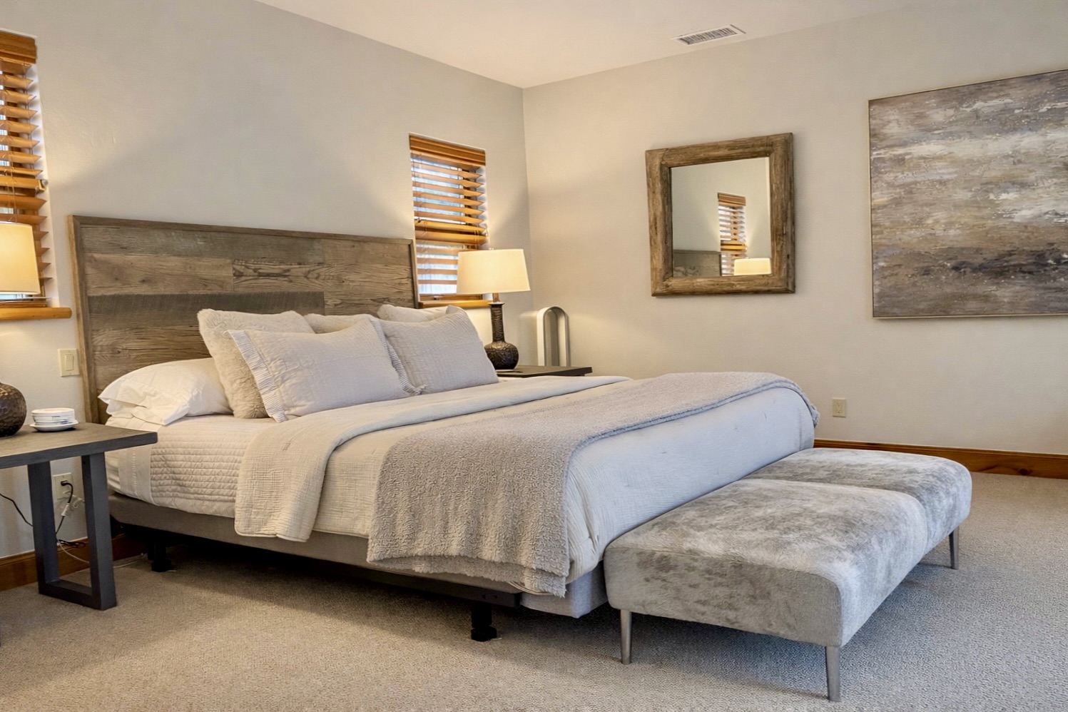 Plush King Tempur‑Pedic bed with a custom cowhide ottoman (no stairs to bdrm)