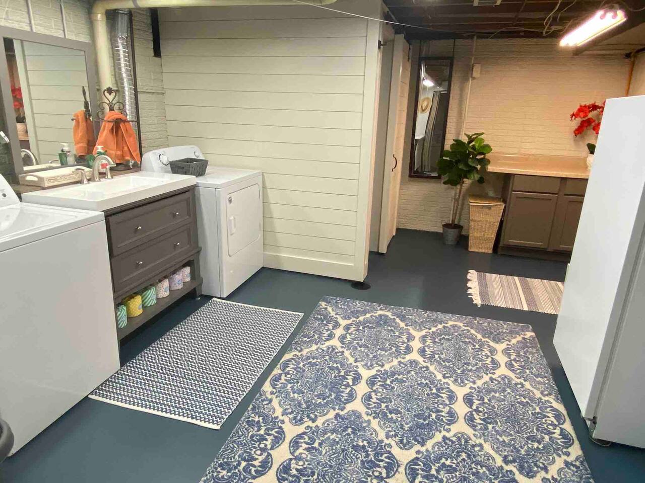 Newly remodeled laundry room with full bathroom.
