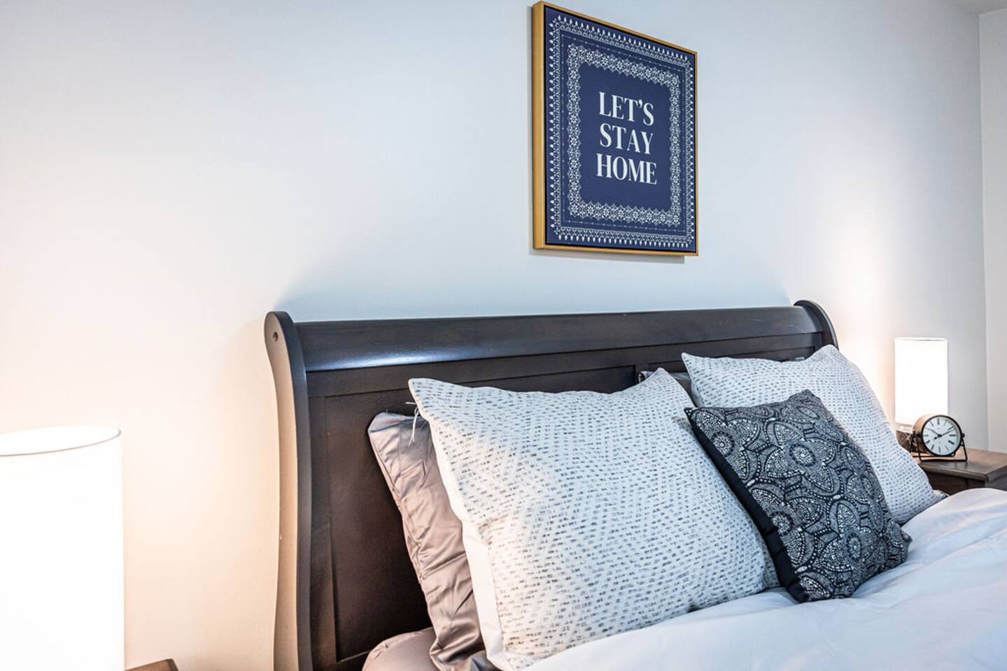 Plush queen-sized bed with soft linens and cozy pillows, creating a serene and comfortable space for a restful sleep.