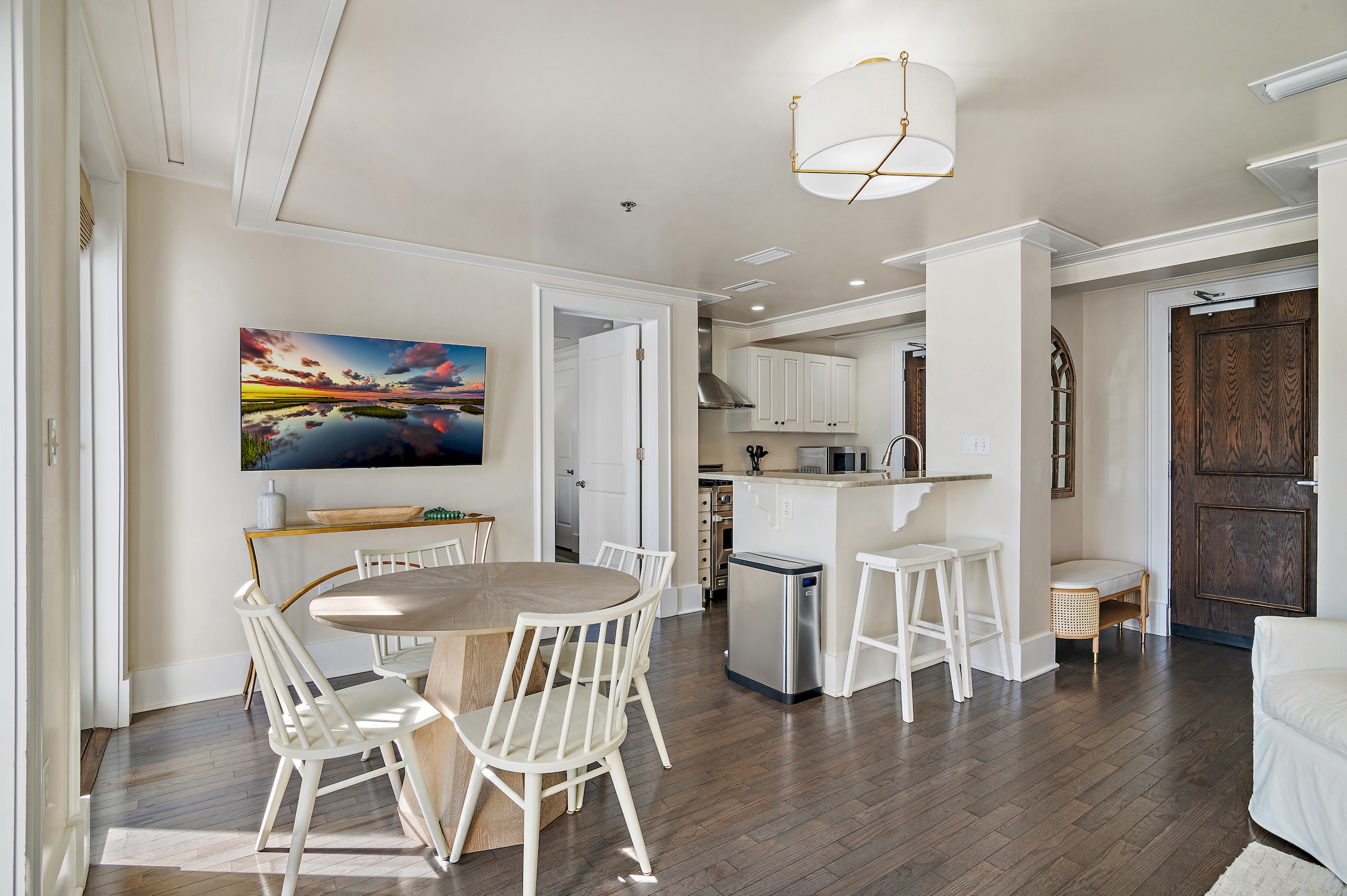 Entry, dining, and kitchen spaces.