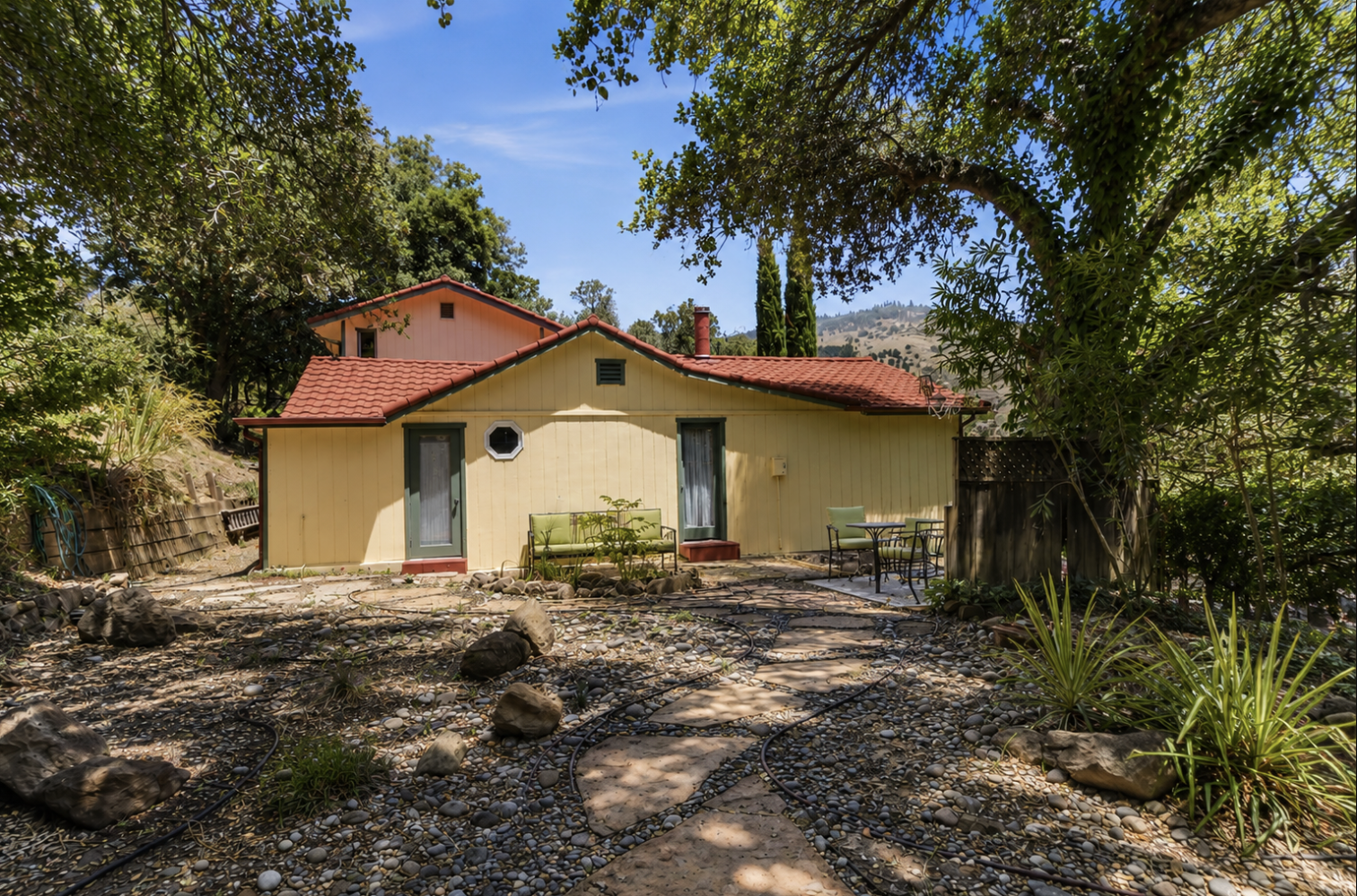 Back of the property with private seating to relax