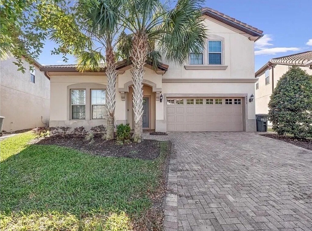 Exterior view with 2 parking spots in driveway with 3 additional cars allowed on street