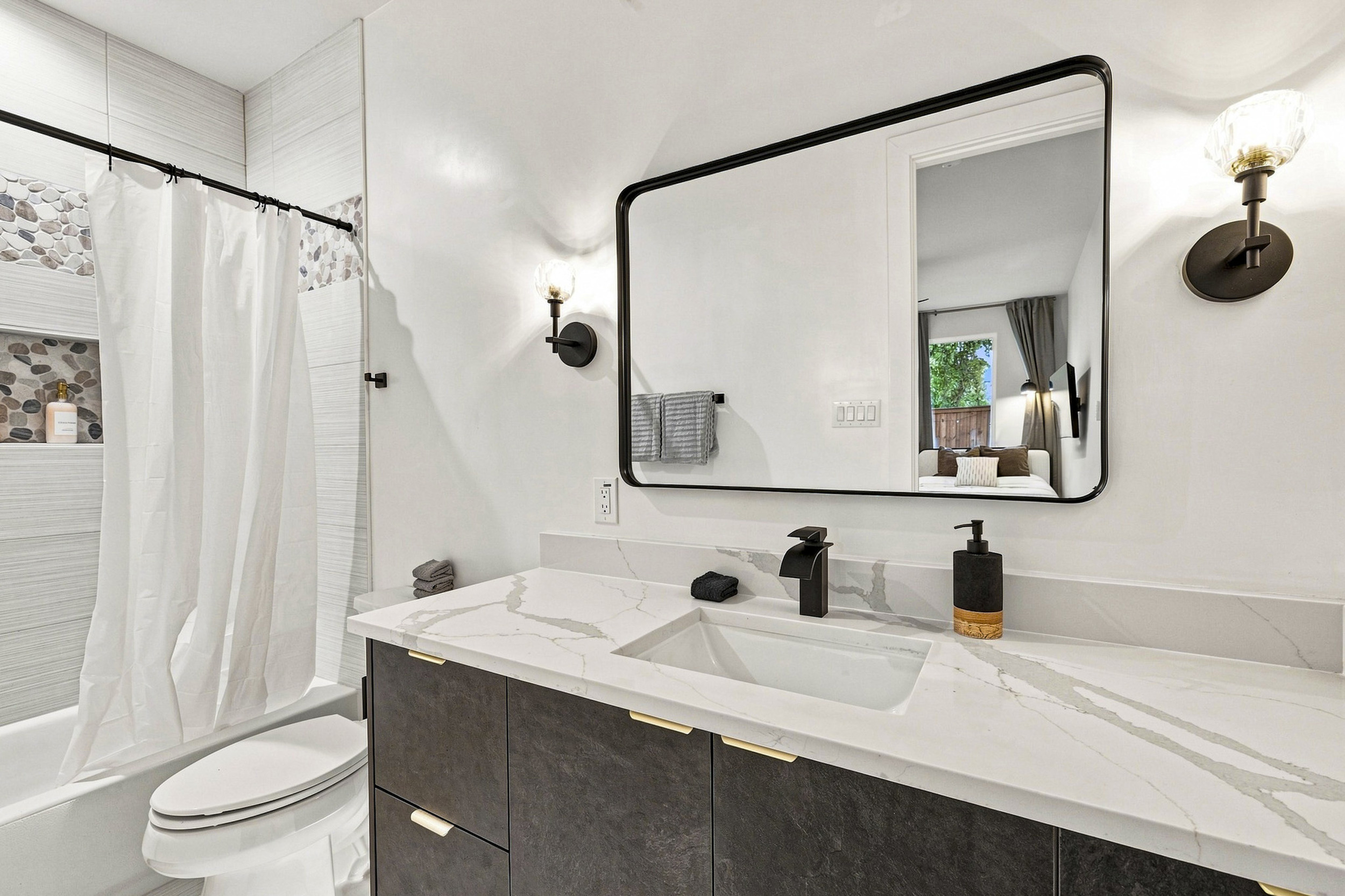Stylish fixtures and elegant surfaces create a refreshing retreat in Dallas!