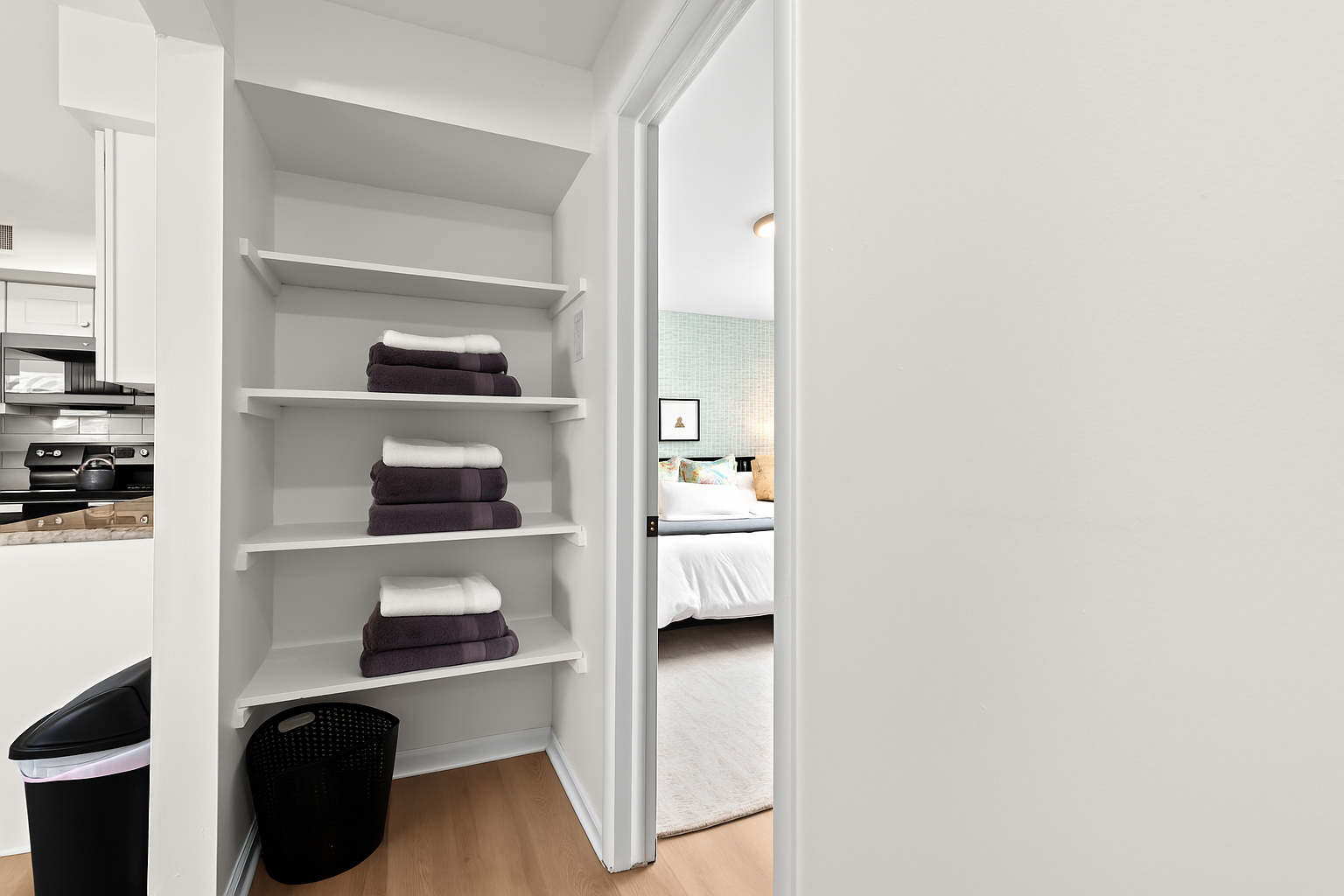 Walk-in closet with ample shelving and space to unpack and stay organized throughout your stay.