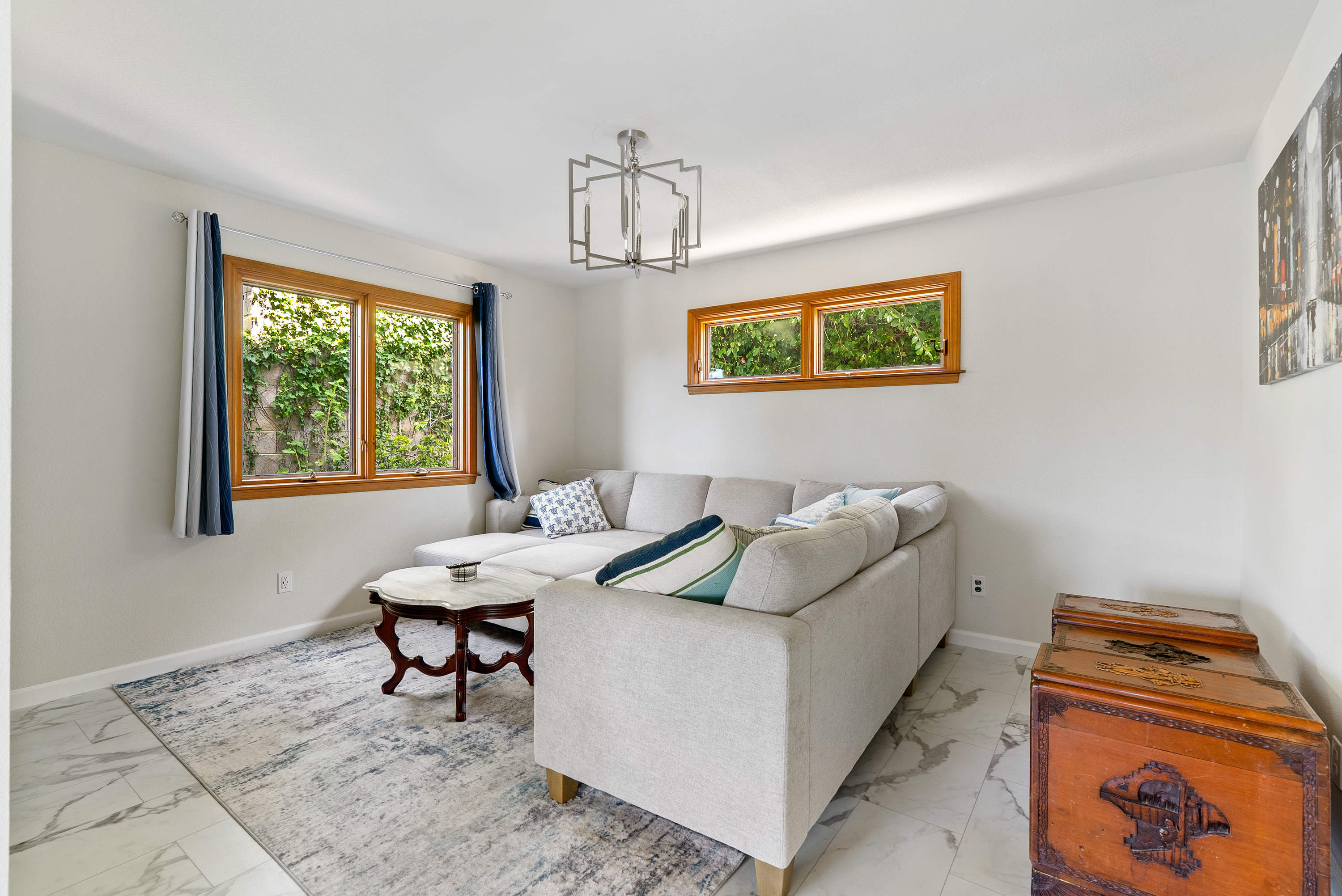 Modern living space with a refreshing green backdrop.