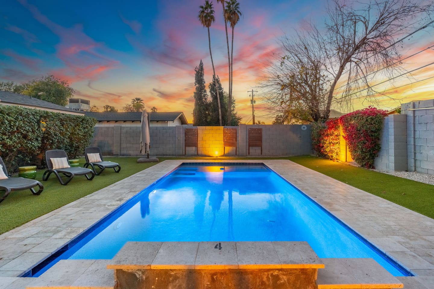 Ambient lighting casting a soft glow on the water, offering a peaceful and serene setting for evening relaxation.