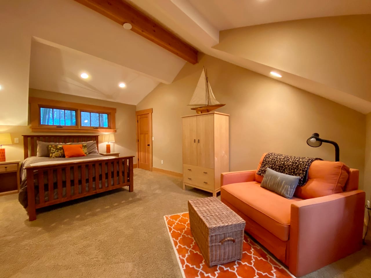 Bedroom #4 with Queen and pull out sleeper sofa. This room is between the main house and bunk room, perfect for parents that might want to be closer to their children sleeping in the bunk room. 