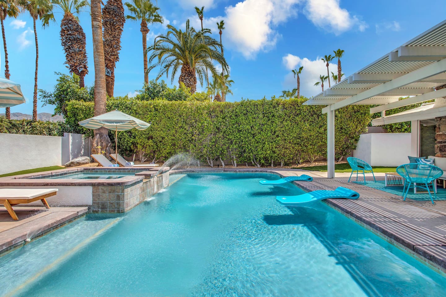 Private secluded pool with mountain and palm tree views
