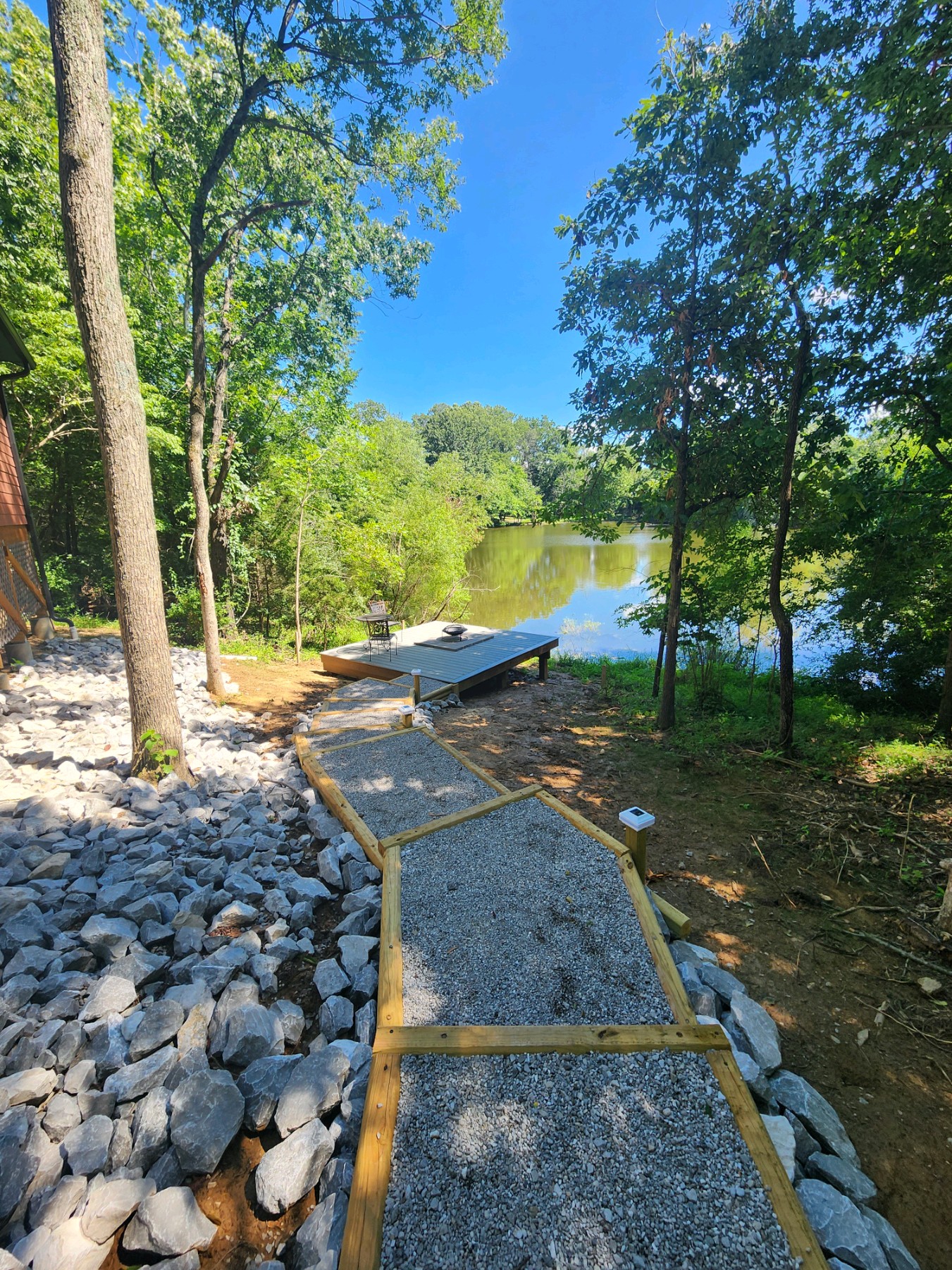 Steps to a Private Deck Overlooking the Pond