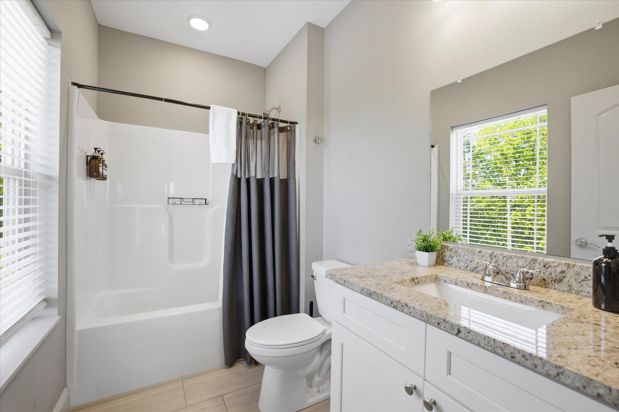 Clean, open, and easy to move through—this bathroom in Unit 3 gives you space to get ready without feeling rushed, with a layout that keeps everything within reach.