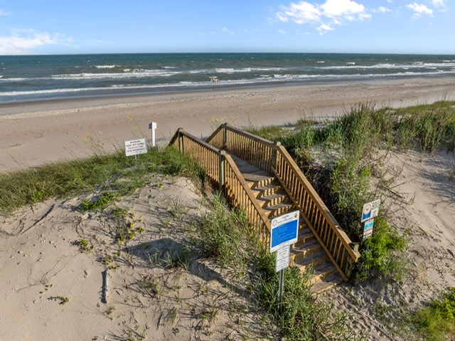Walk barefoot to the waves with beach access only moments away