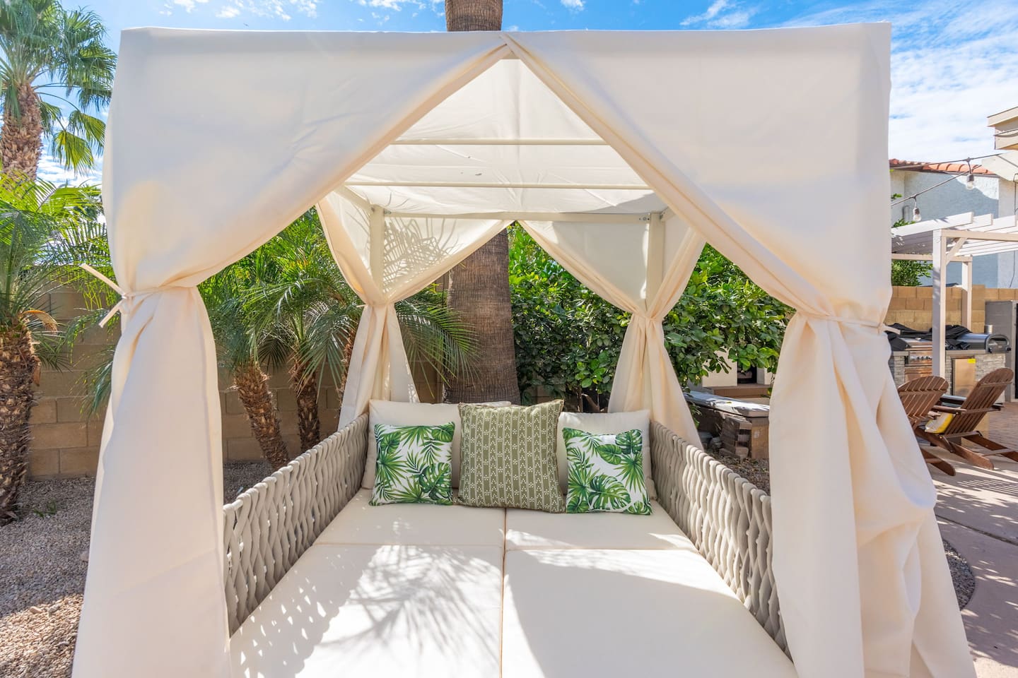 Relax like royalty in this backyard in this canopy cabana bed.