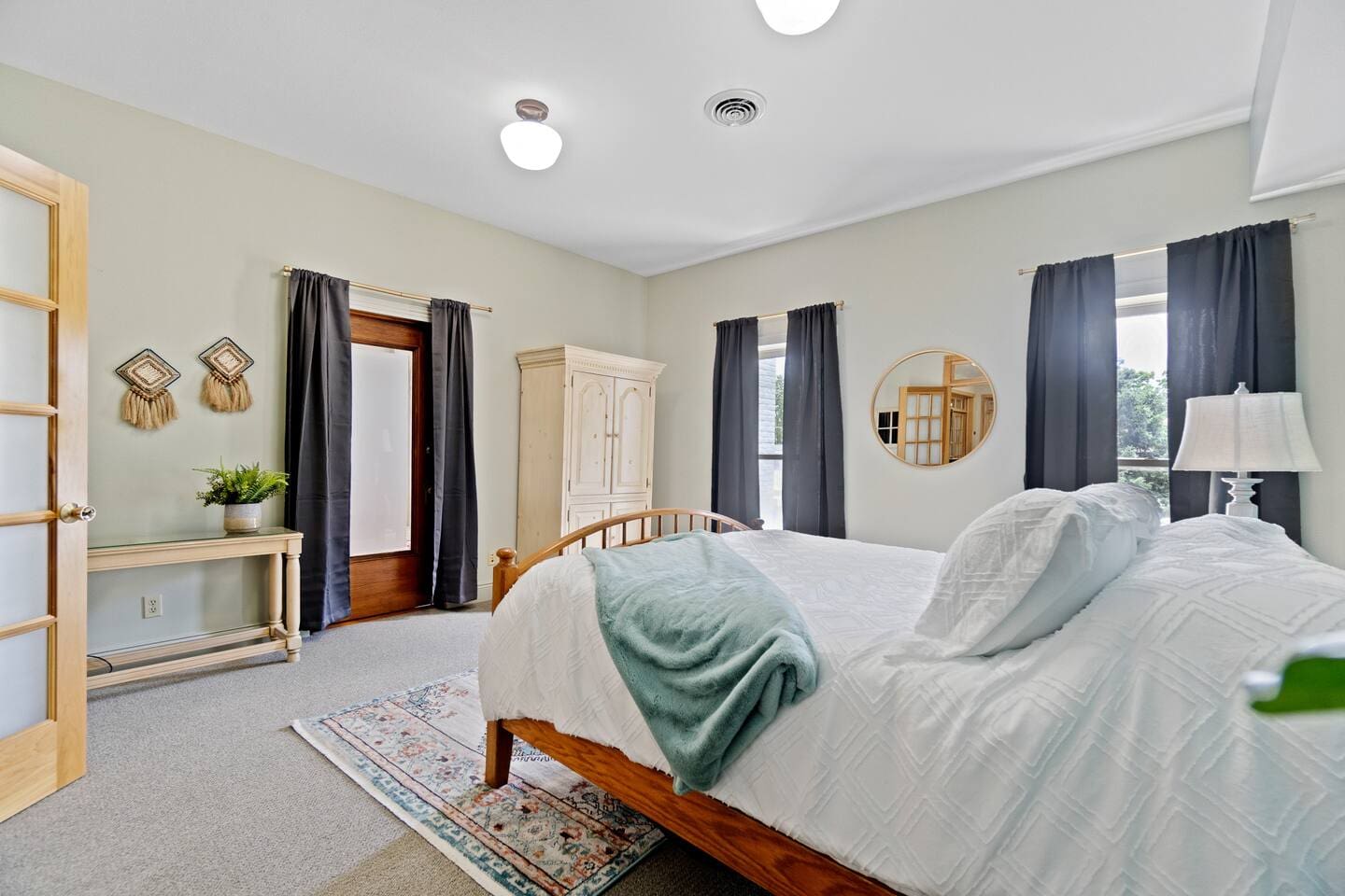 Stunning view from the bedroom, featuring large windows that fill the room with natural light and offer a scenic outlook.