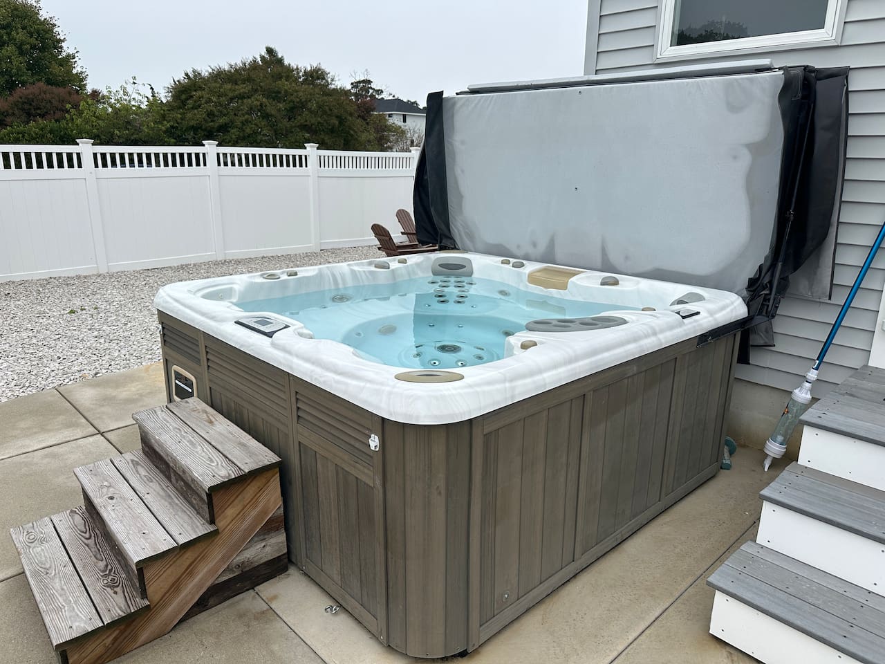 Dive into pure bliss in our premium hot tub, perfectly situated for a soak after a long day of beach adventures. This private, fenced-in backyard feature ensures your vacation is as relaxing as it is memorable.