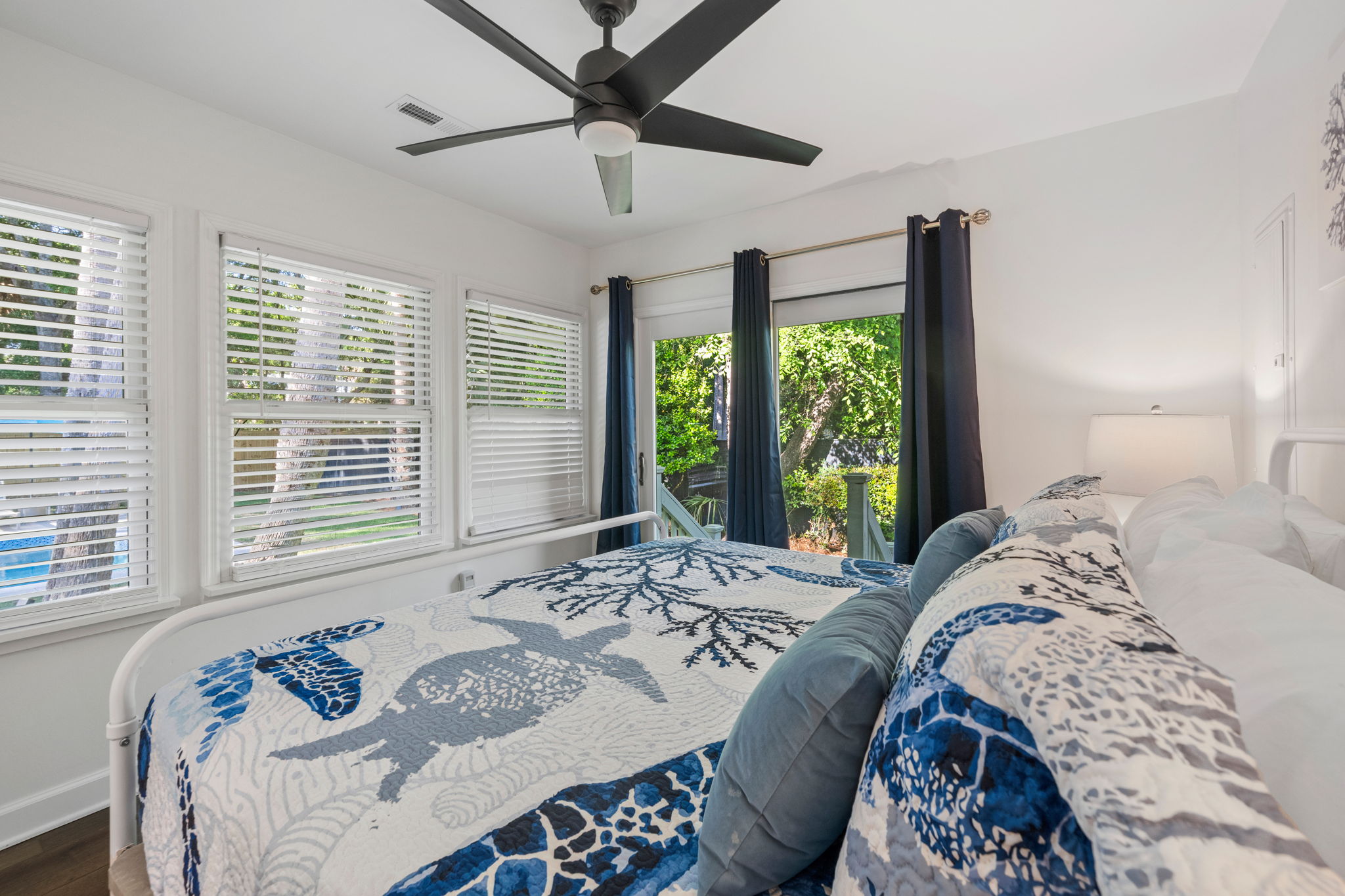 King Bedroom 3 Overlooks The Pool and Has a Private Entrance To Backyard | IOP Escapes Beach Blessing | 3705 Hartnett Blvd, Isle of Palms, SC