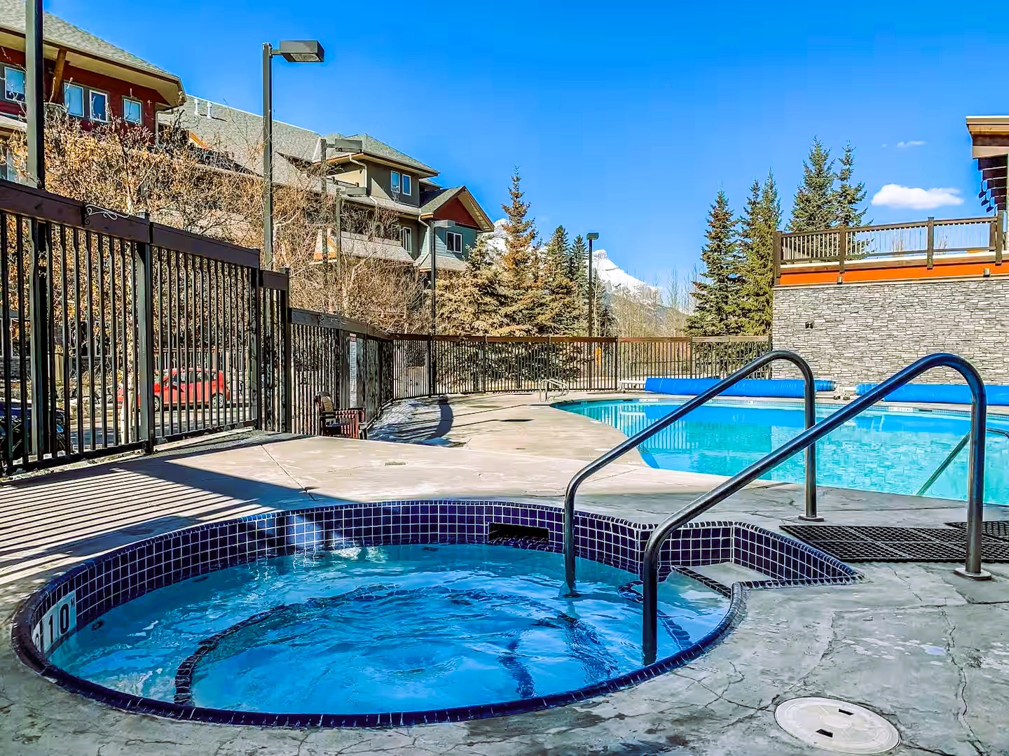 There are 3 hot tubs at the complex, one downstairs, one by the pool, and one more in the 3rd building.