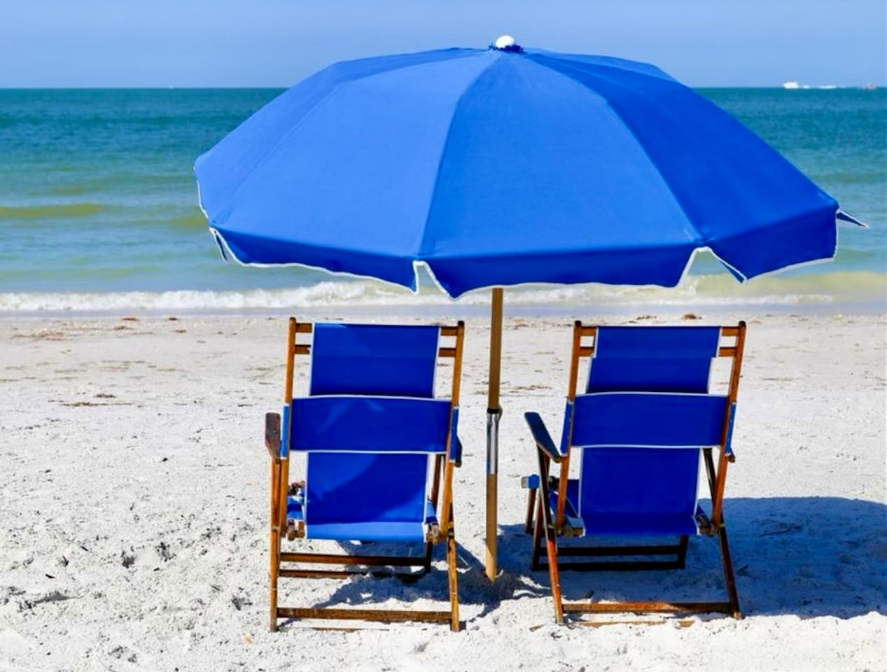 Beach chairs and umbrella