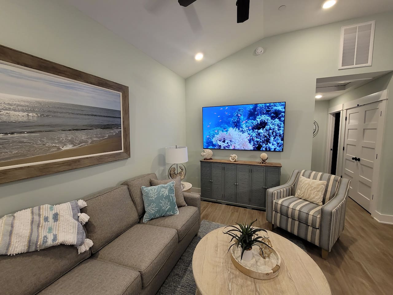 Large 75 inch Smart TV with HDMI jacks for easy gaming connections.  