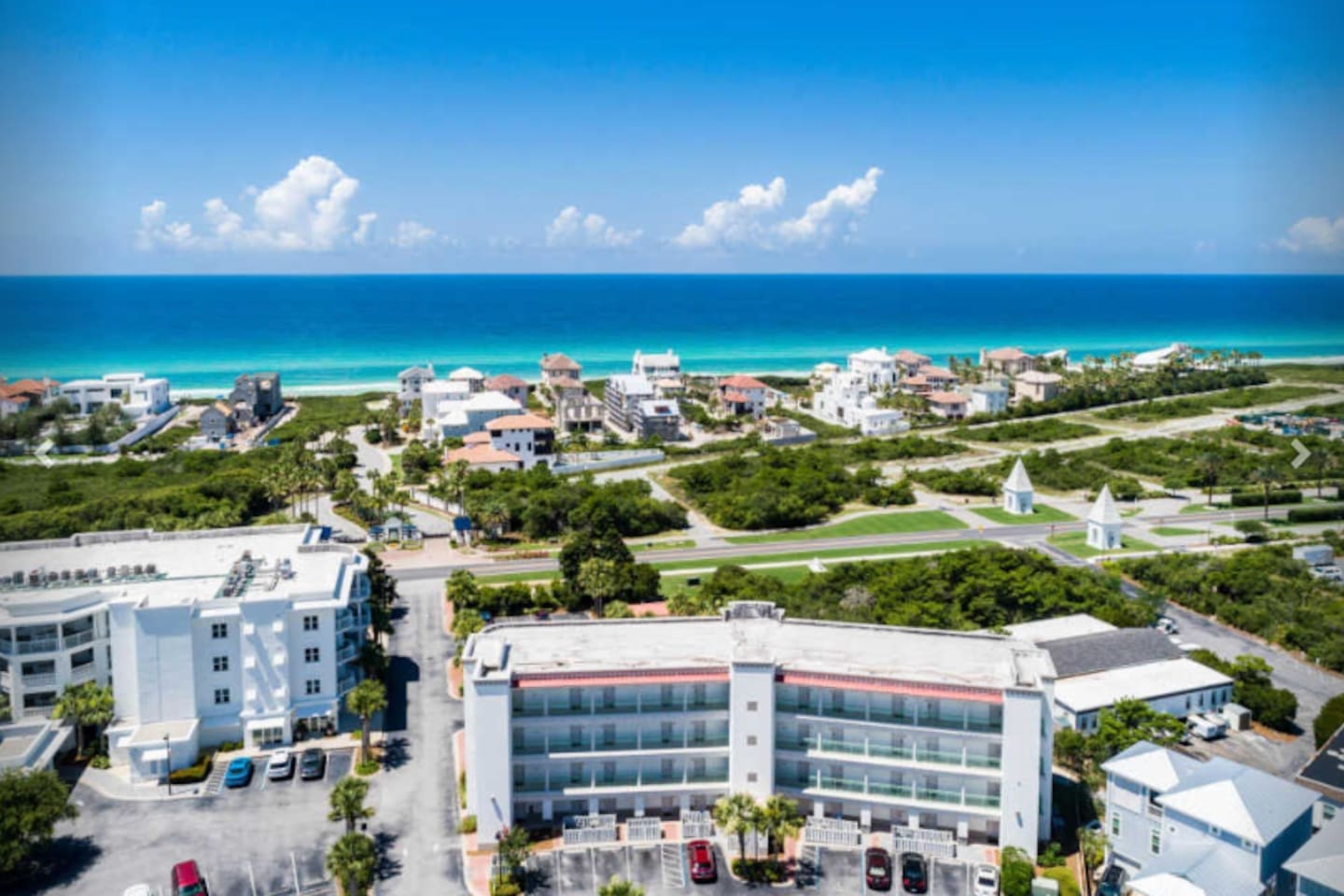 The beach is right down the street! Our unit is in that big complex on the right. 