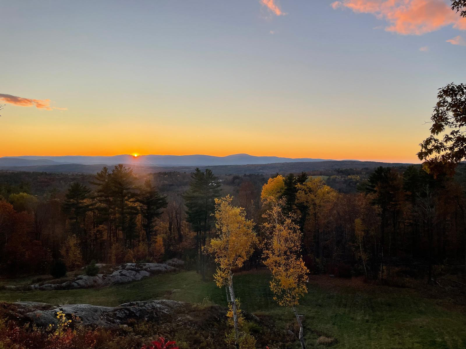 Sunset over the ridgeline from Sunset Falls Estate, golden birches and fall color in the valley below &mdash; New Marlborough, Berkshires
