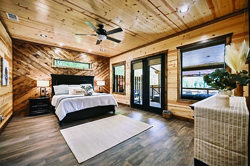 Wake up to serene pond views from your private King Suite—complete with soaking tub and walk-in shower