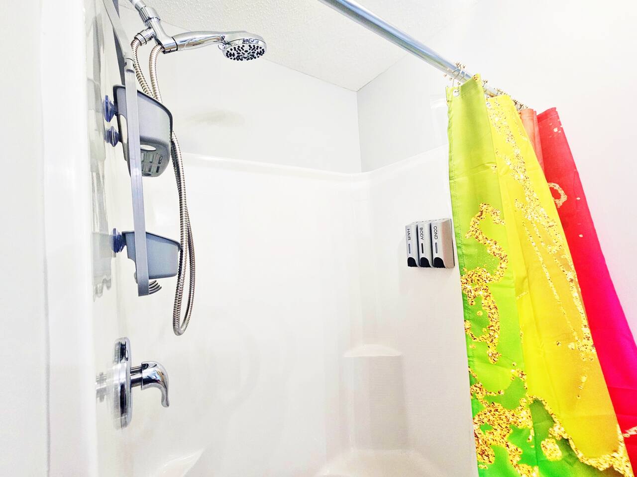Brand new spa handheld shower head and dispensary.