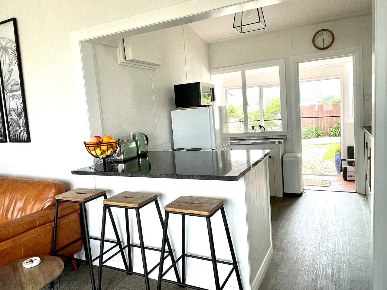 Breakfast bar area with view out to the courtyard.