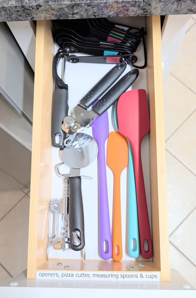  measuring cups and spoons • peeler • pizza cutter • can opener • wine/bottle opener • spatulas