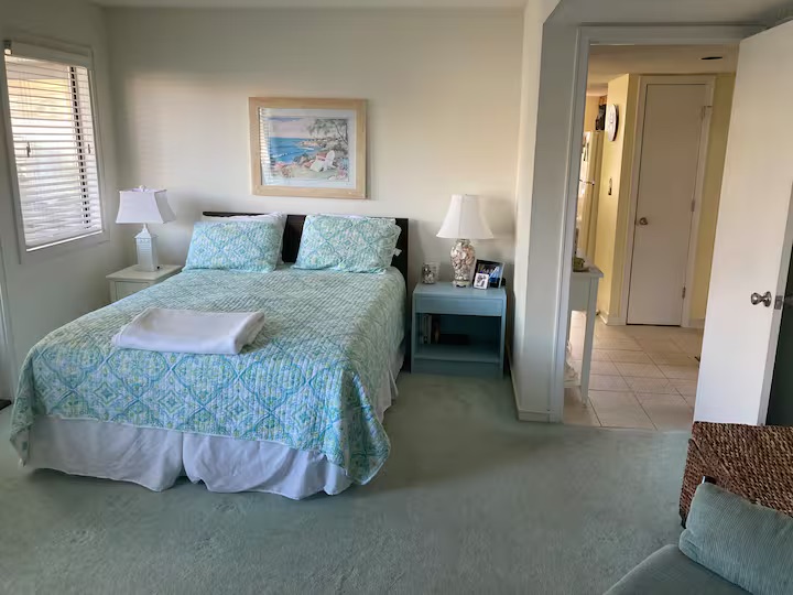 Main Bedroom with a queen bed and ensuite