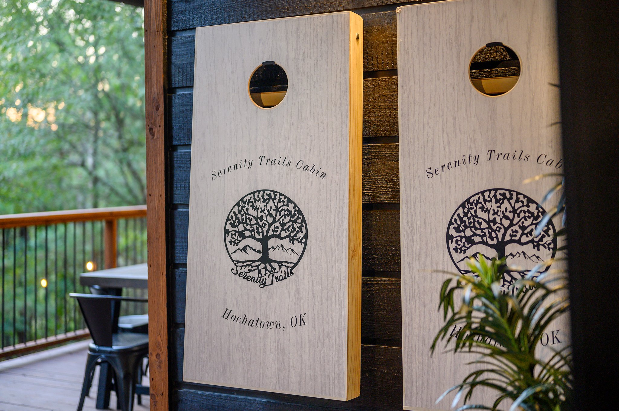 Custom cornhole on the deck—perfect for sunny afternoons in the pines.