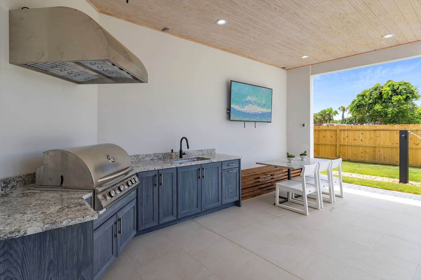 Summer kitchen with outdoor grill.