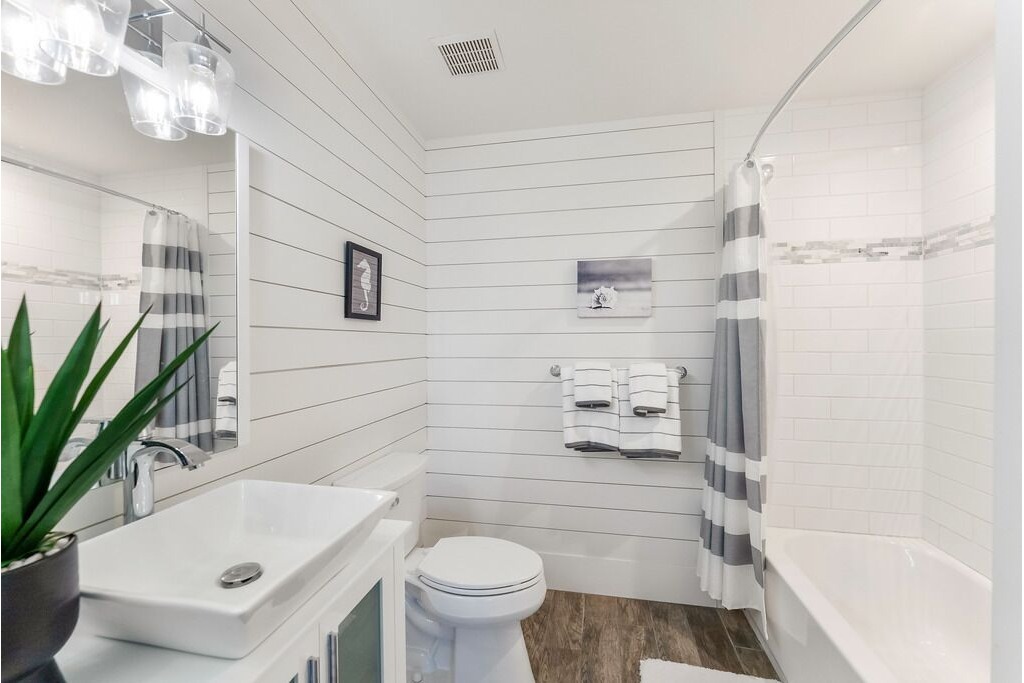 Full bathroom with shower and tub combo