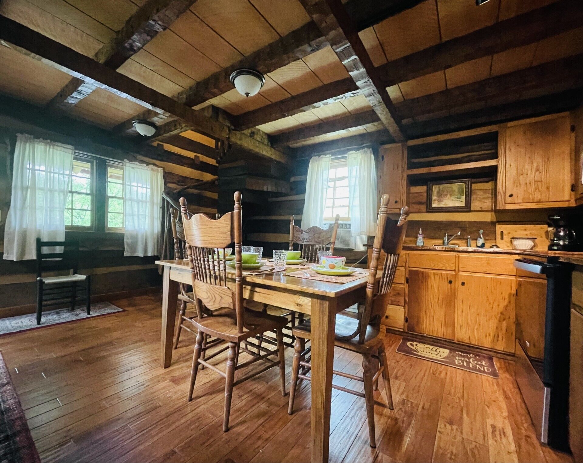Kitchen and Dining. The kitchen is stocked for basic cooking and eating
