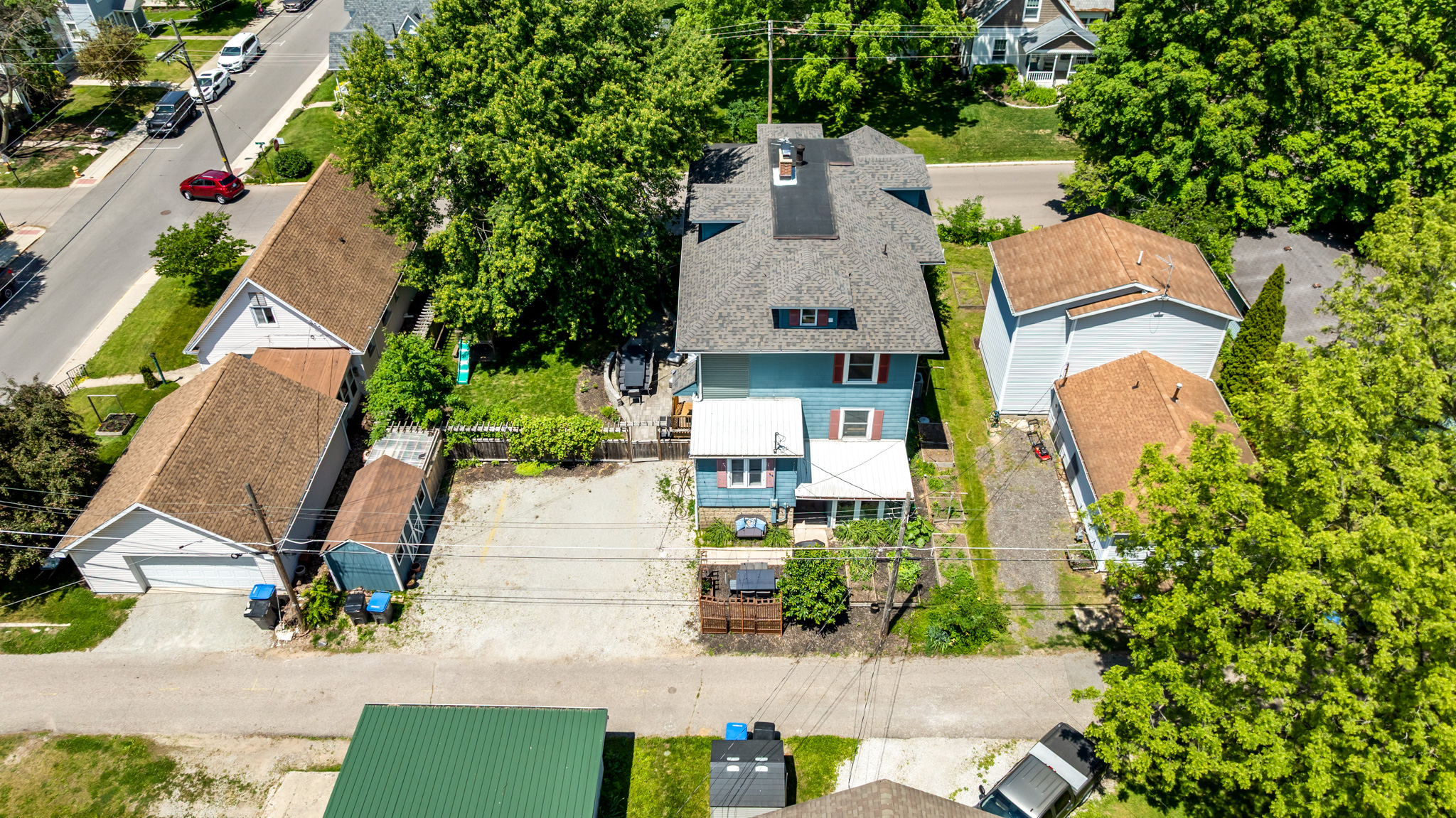 See the layout! This bird's-eye view highlights the property's generous footprint with plenty of private parking for large groups.