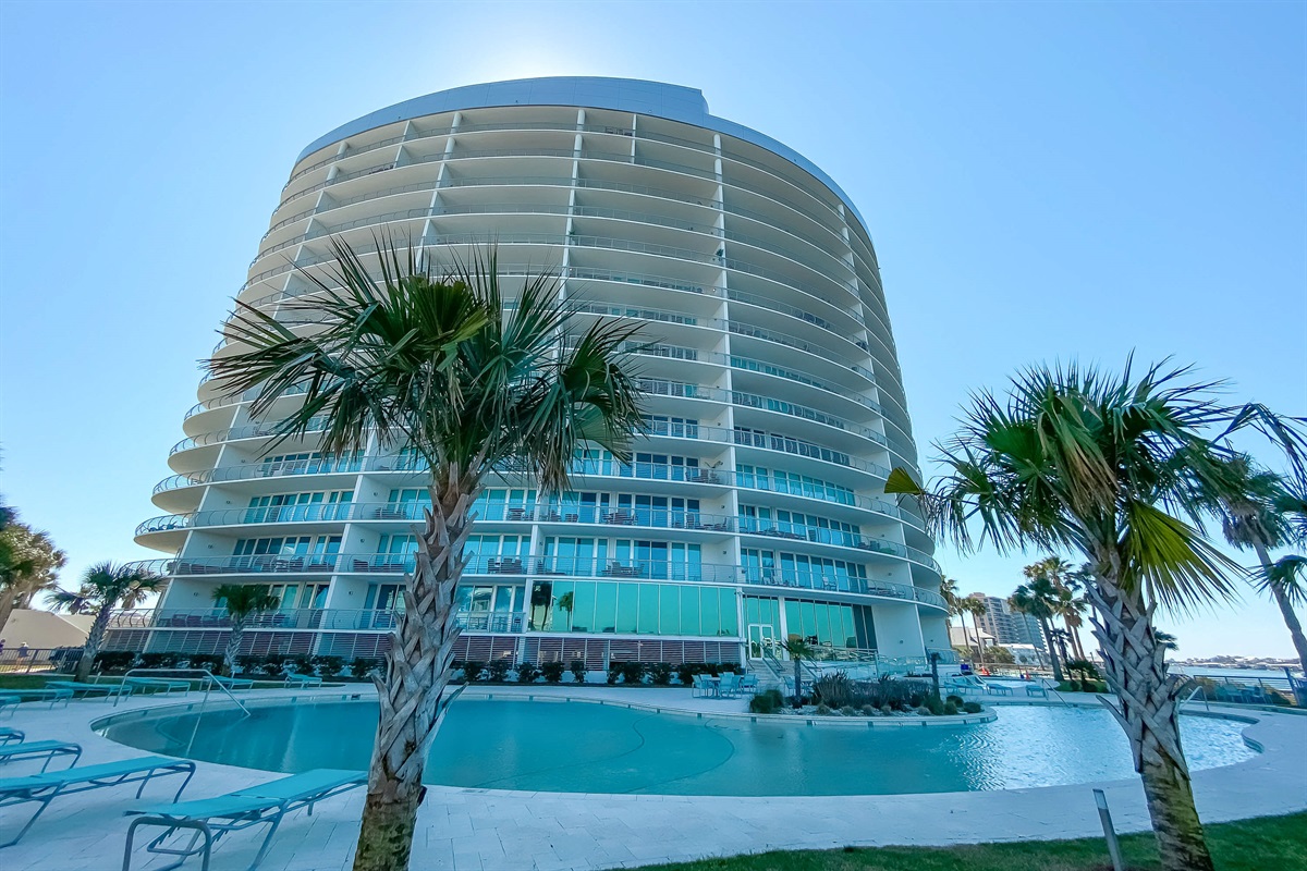 Where emerald waters meet refined coastal living. Bella Luna Luxury Condominiums offer an unparalleled waterfront experience.