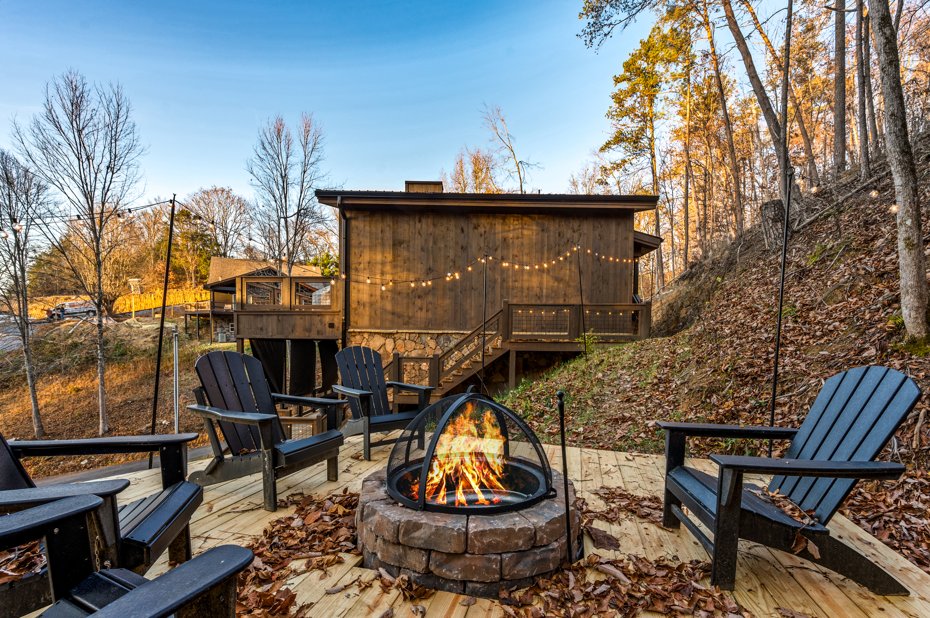 Firepit area with a spacious floating deck and seating for 6