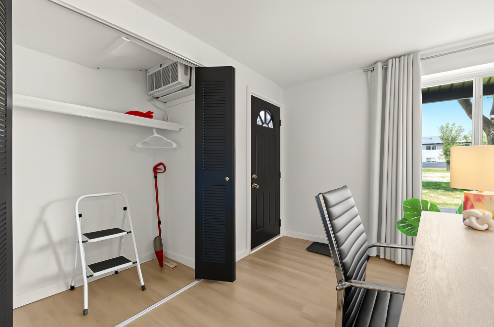 This front closet is stocked with essentials including a step stool and cleaning tools—making longer stays even easier.