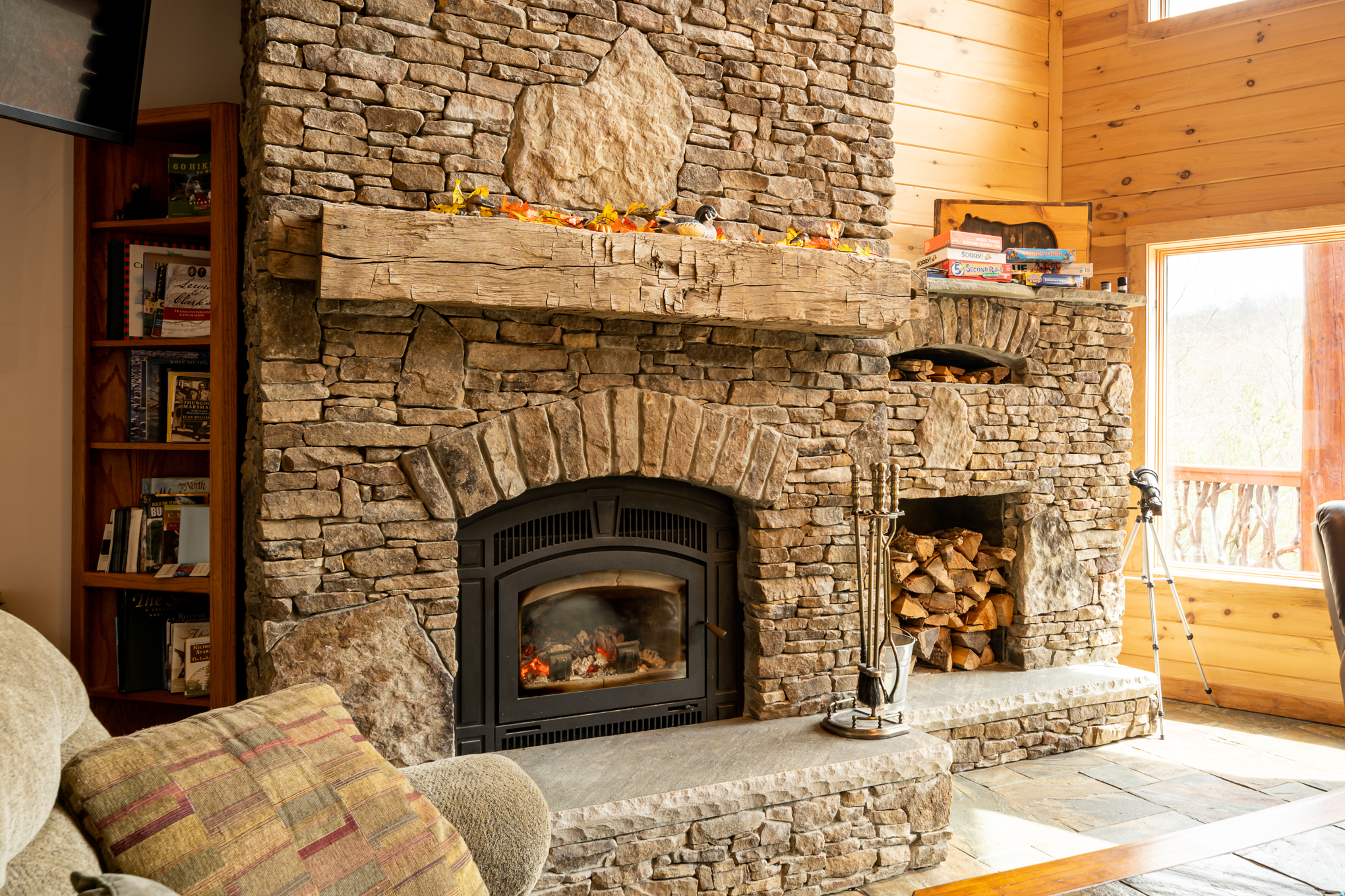 Woodburning Fireplace stocked with Firewood during Winter