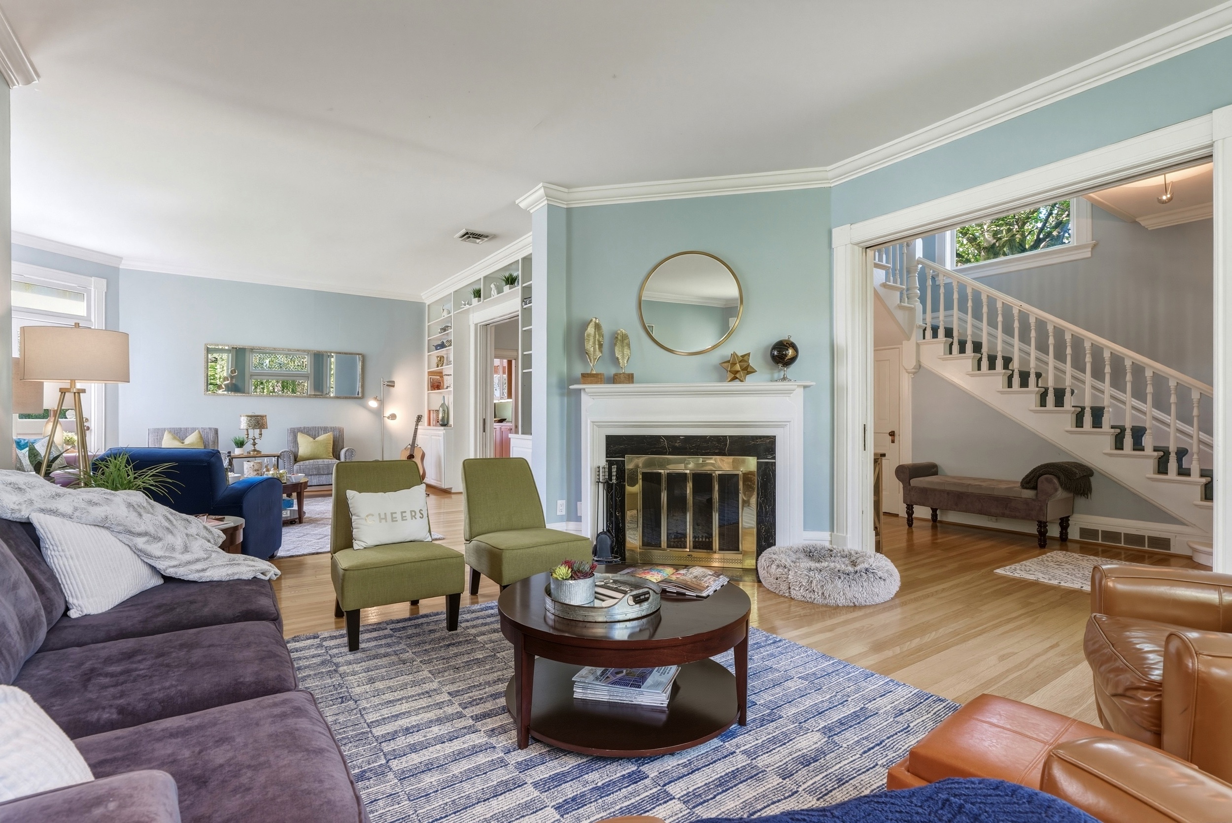 Great room with a wood burning fireplace (firewood provided)  perfect for lounging, and a pull-out couch for flexible sleeping arrangements.