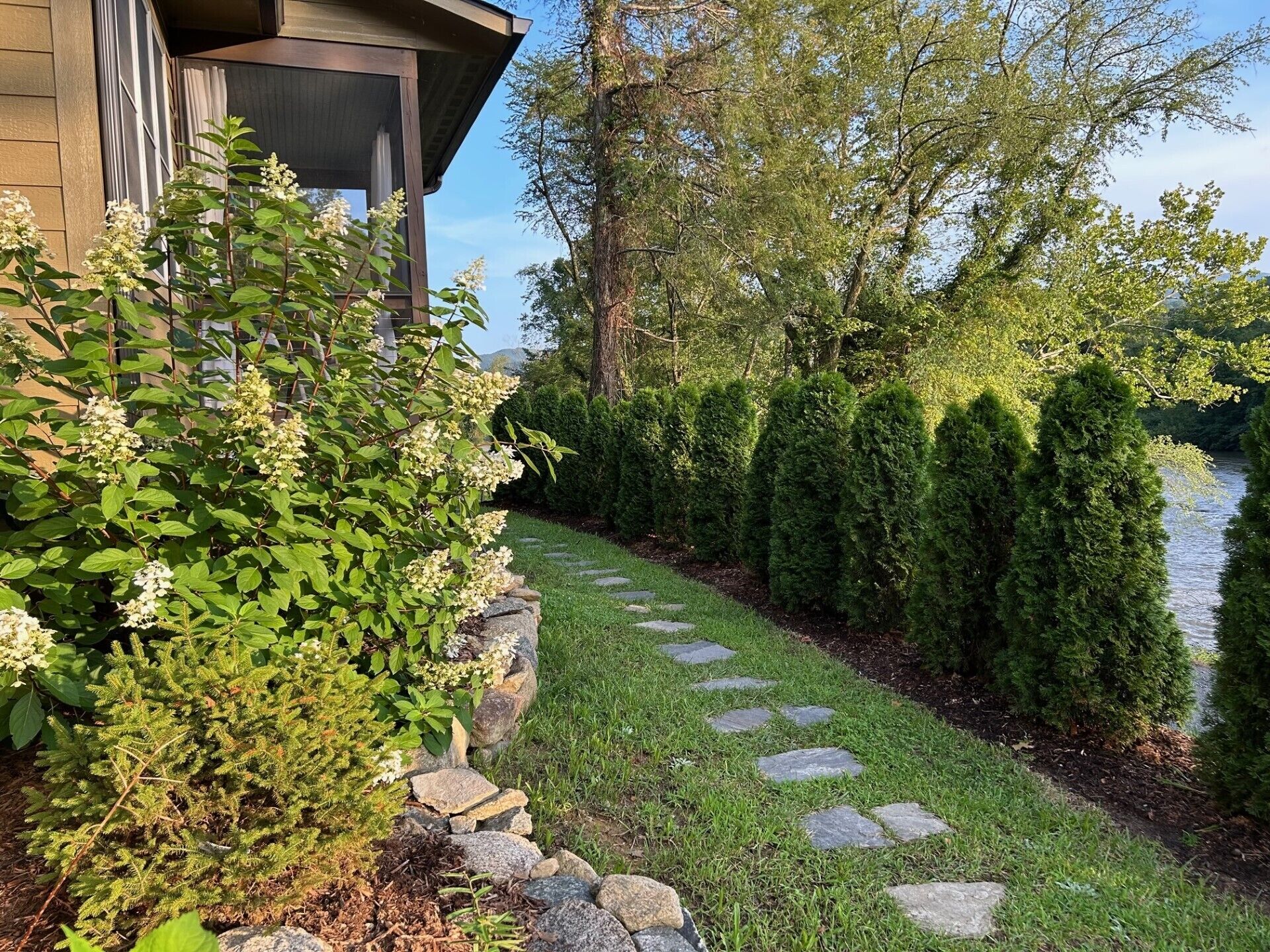Tended stepping stone walkway to the entrance door