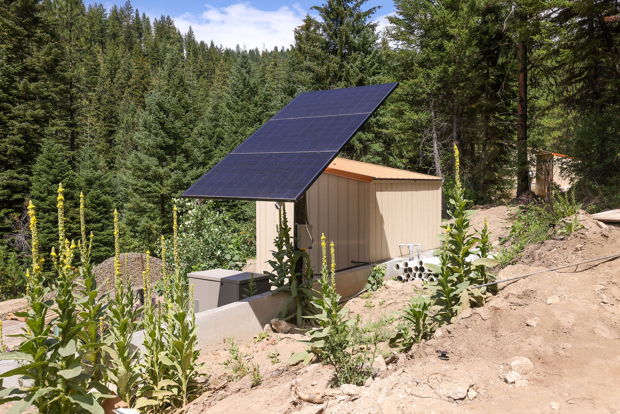 Solar panels and other amenities make this property off the grid