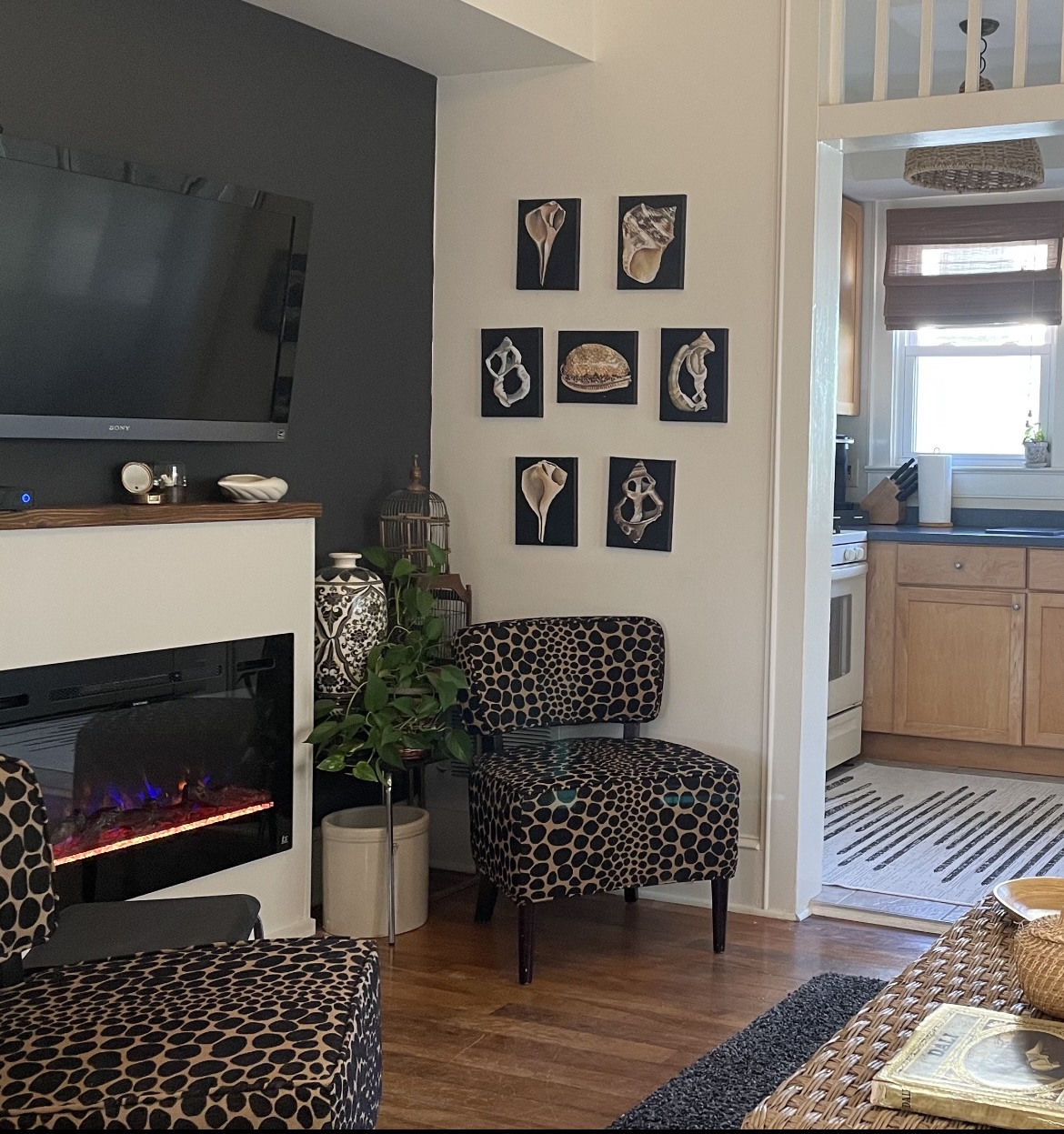 the fireplace adds warmth and or ambience at the touch of the remote