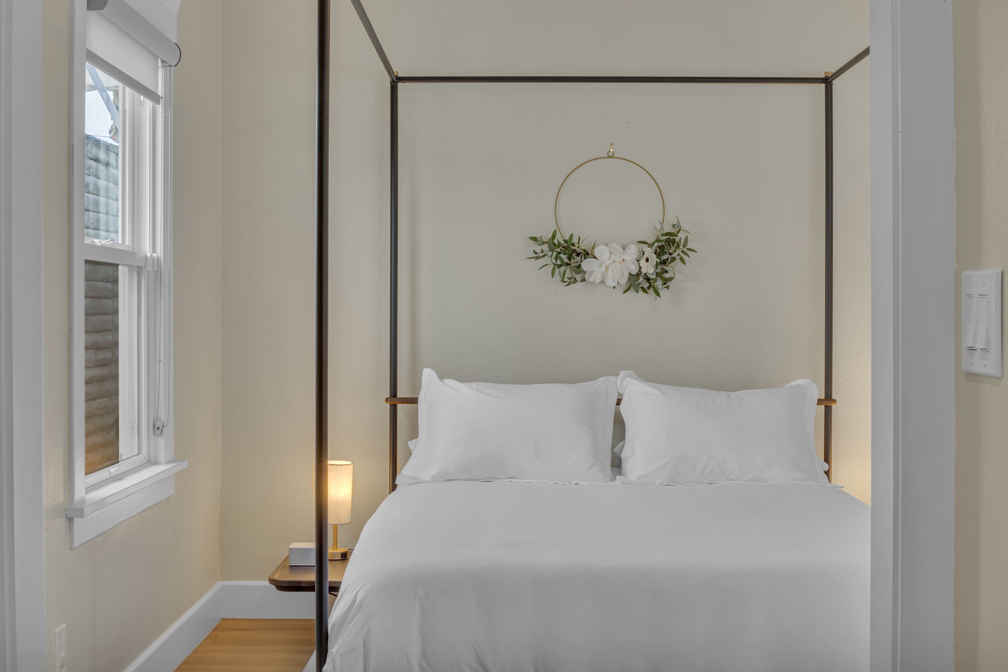 Cozy up in our dreamy canopy bed with luxe linens and soft lighting. The perfect retreat after a day exploring San Diego.