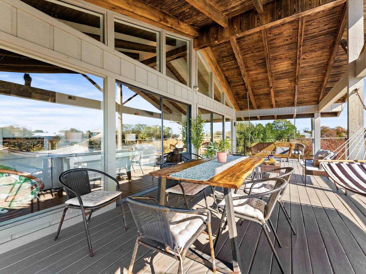 Dine al fresco on the private balcony overlooking the water.