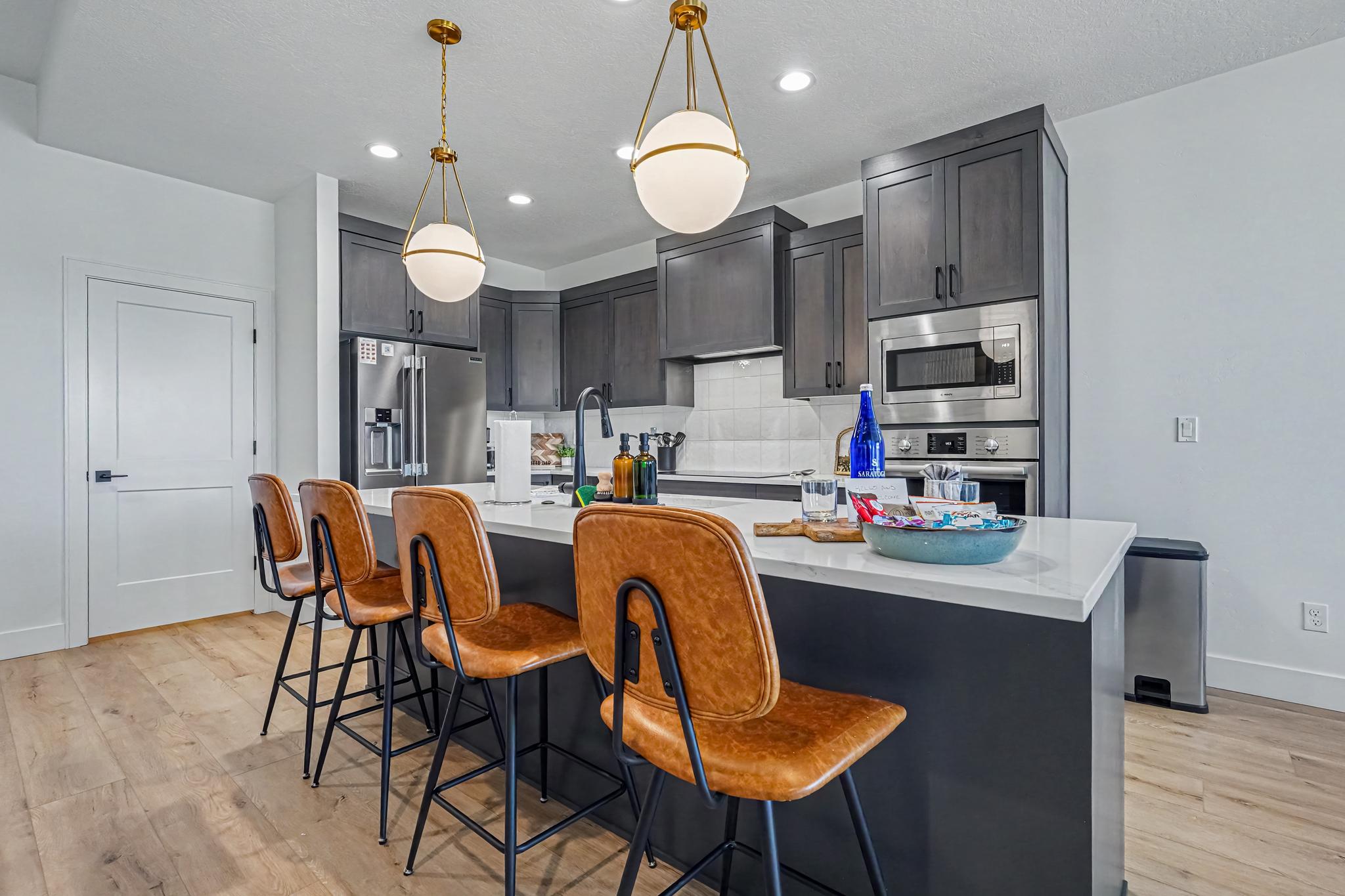 Spacious breakfast counter with seating for four.