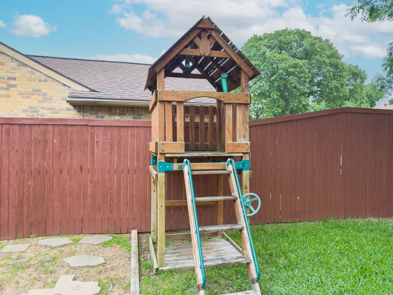 Backyard playset for kids to enjoy outdoor fun.